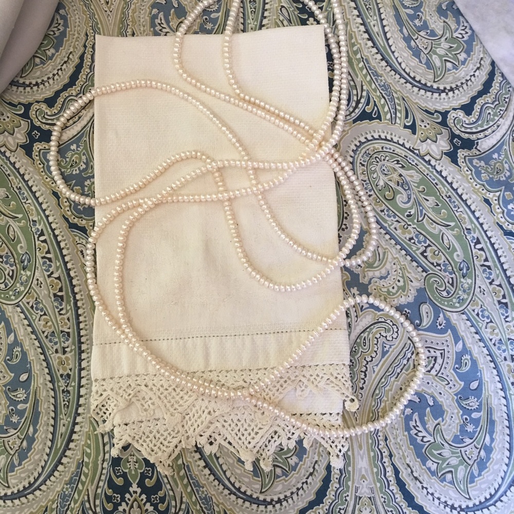 70” rope necklace of natural pearls
